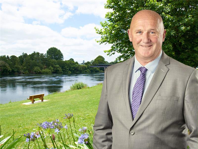 Cr Patterson stands by the Waikato river