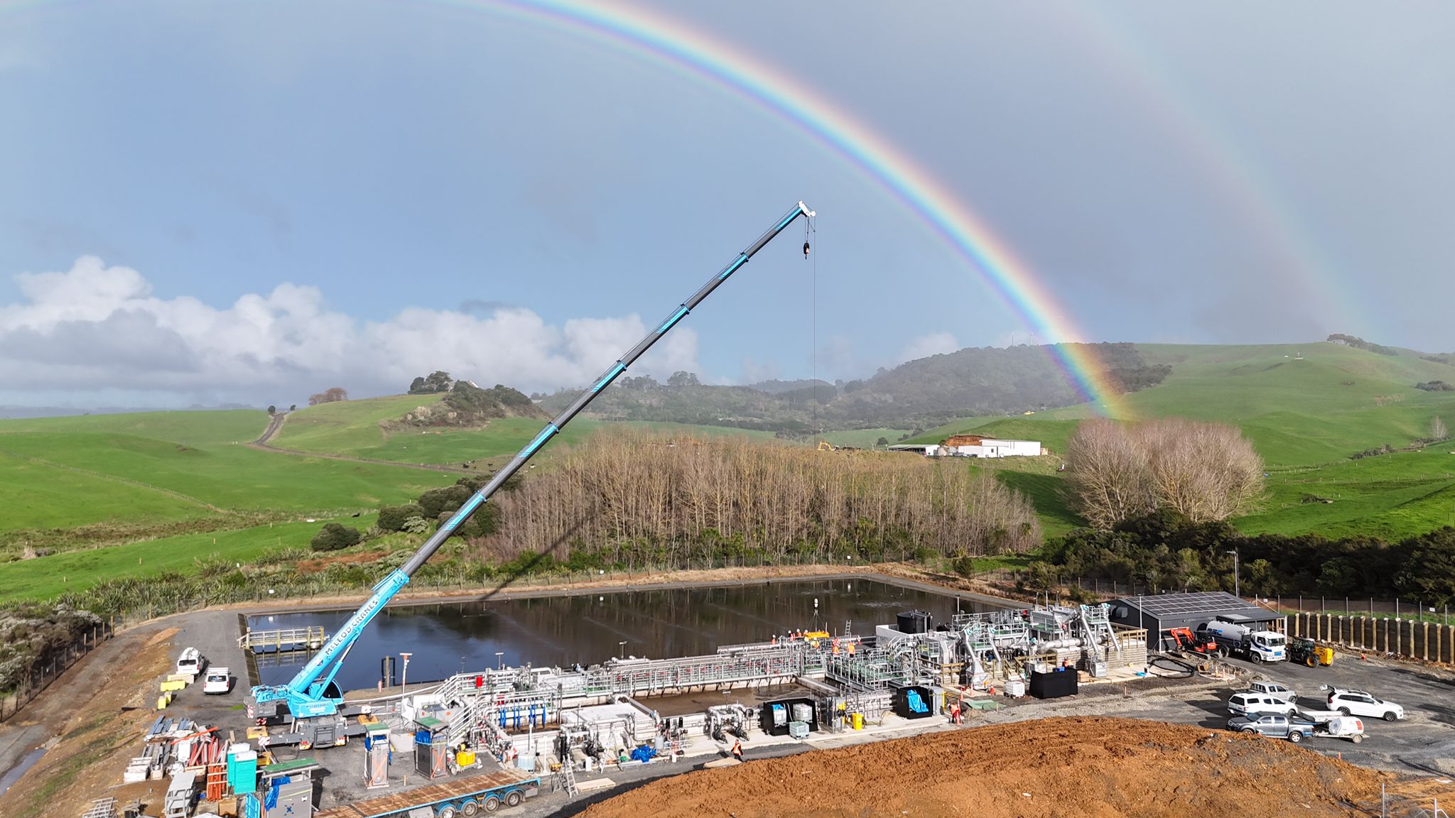 a rainbow over the waste water treatment plant in raglan