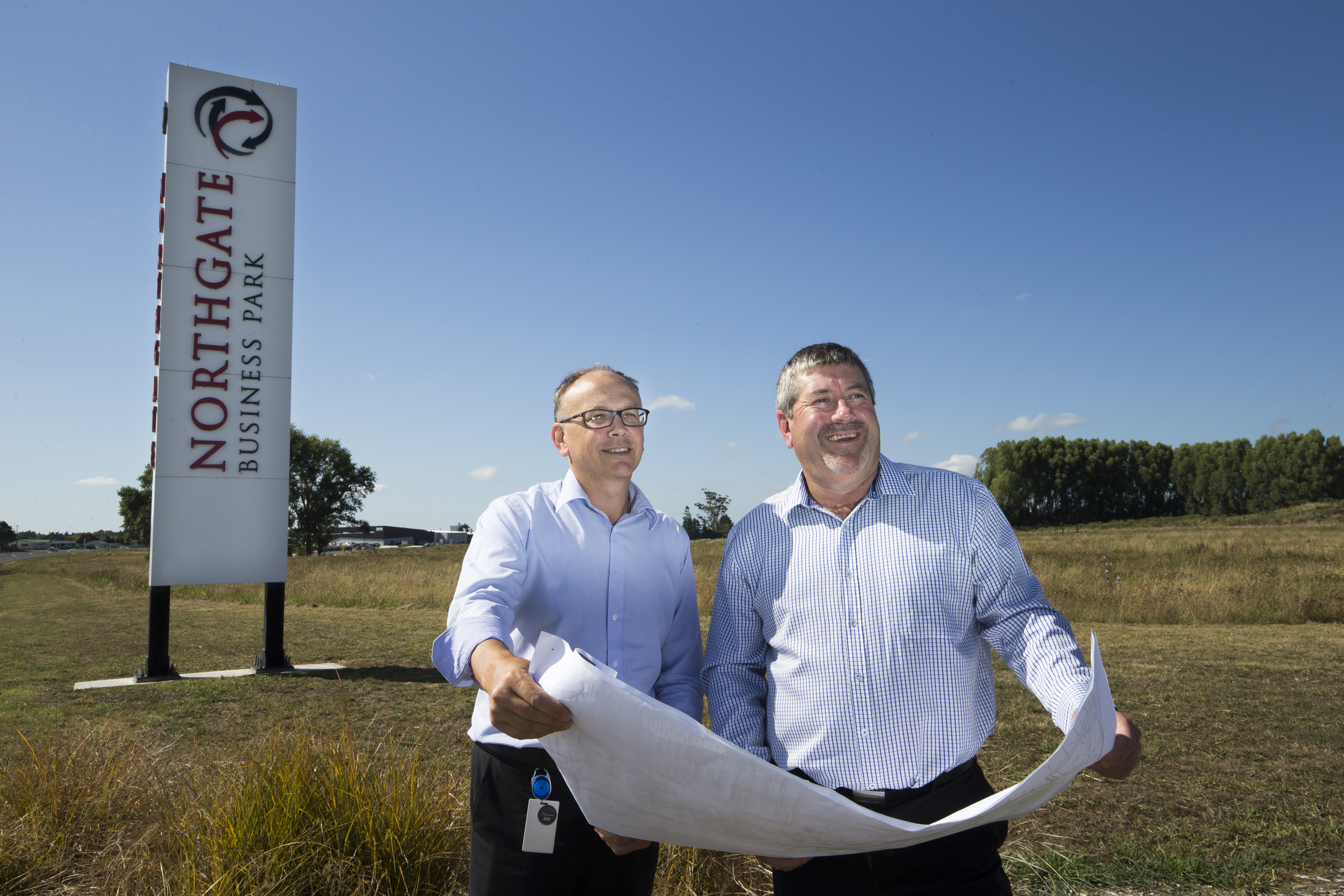 Clive Morgan and Mayor Allan Sanson with the plans for the new hub. Photo by Peter Drury
