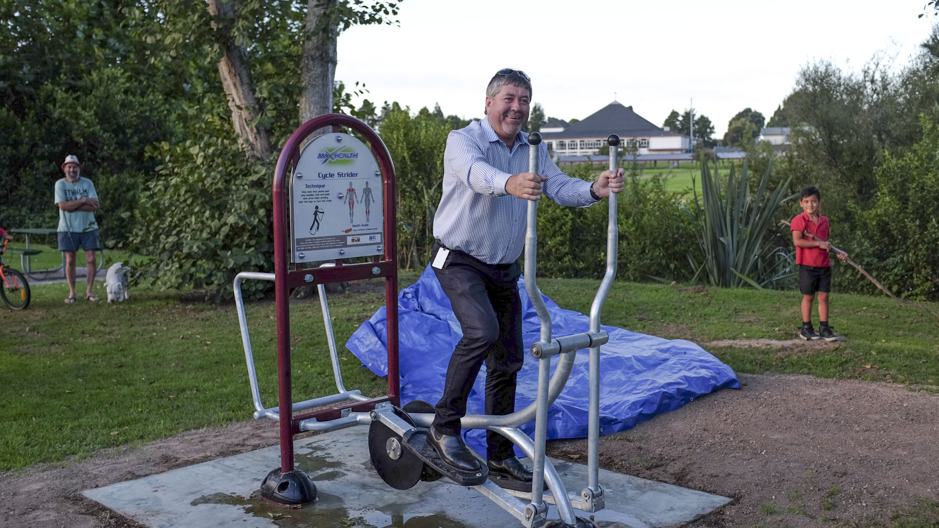 Waikato District Mayor Allan Sanson tries the new fitness trail cycle strider